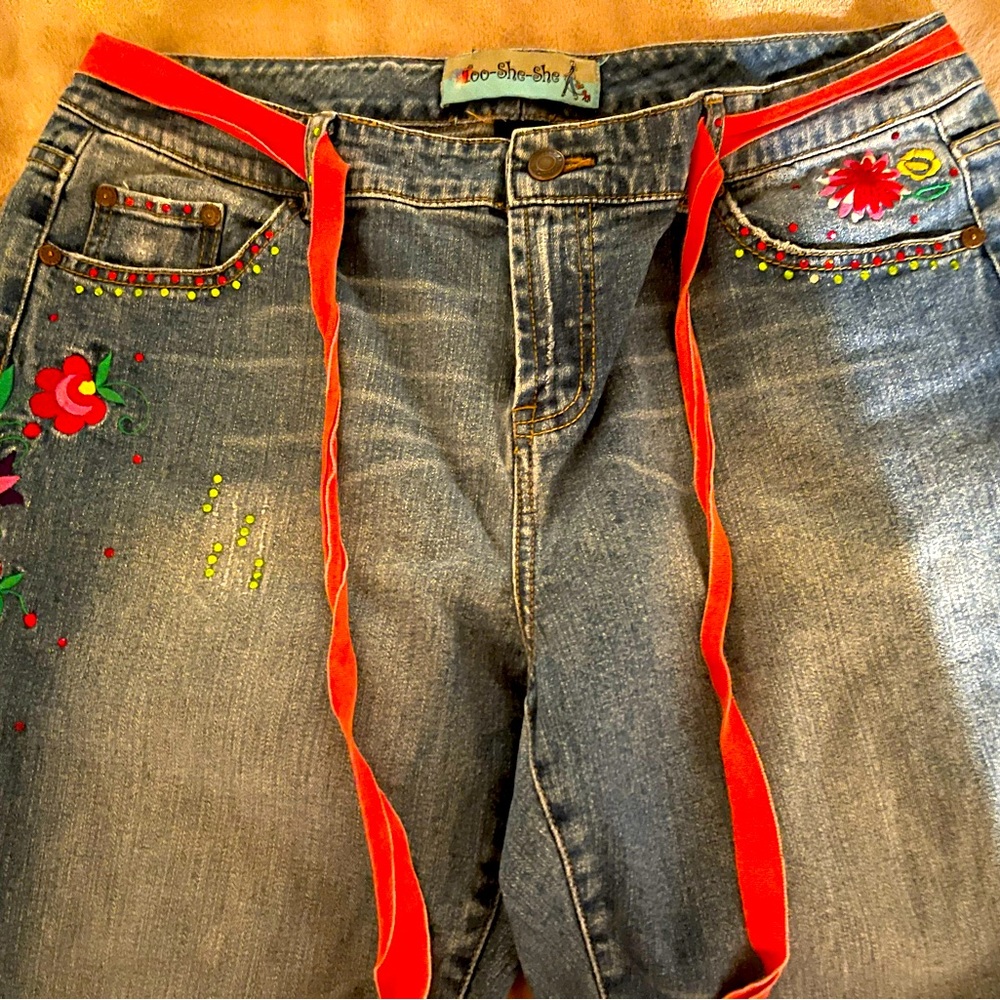 Embroidered Denim Jeans with bold Accents